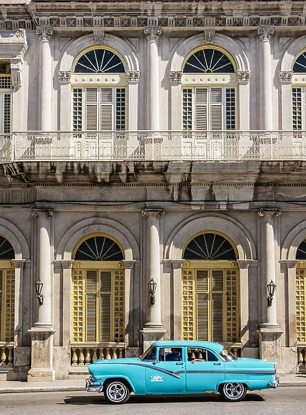 Vintage car passing in front of Casino Espanol, Libertad Square, Matanzas
