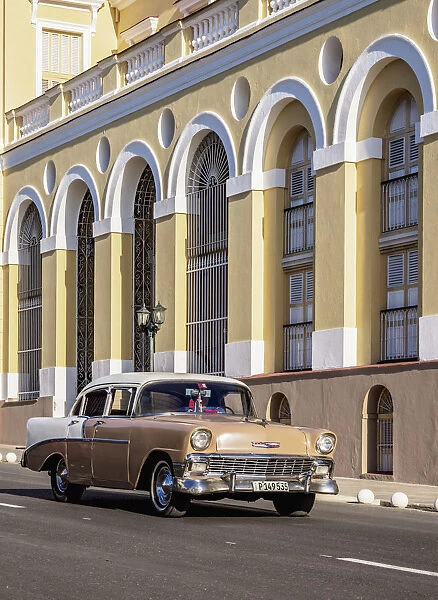 Vintage car passing by the Sauto Theater, Matanzas, Matanzas Province, Cuba