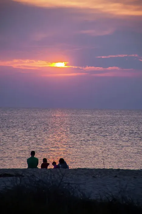 Framed Print : Visitors gather at Sunset Beach to watch the sunset Framed Print : Visitors gather at Sunset Beach to watch the sunset