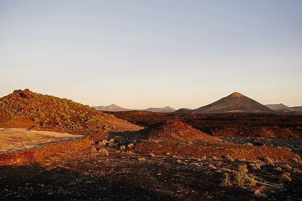 Volcanic landscape at sunset, Timanfaya, Lanzarote, Canary Islands. Spain