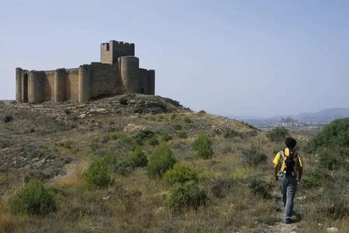 Framed Print : A walker approaches the 13th Century Castillo de Davalillo Framed Print : A walker approaches the 13th Century Castillo de Davalillo