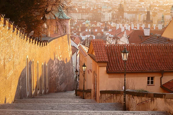 Walking down the stairs to Mala Strana district, Prague, Czech Republic
