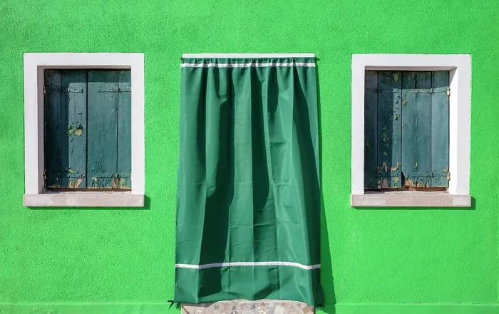 Framed Print : Wall of a green house, with green window shutters, the island of Burano, Venice, Italy Framed Print : Wall of a green house, with green window shutters, the island of Burano, Venice, Italy
