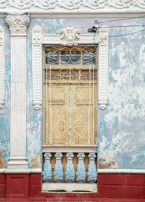 Framed Print : Wall of old colonial house, with columns and ornate iron window grill, Cienfuegos, Cienfuegos Province, Cuba