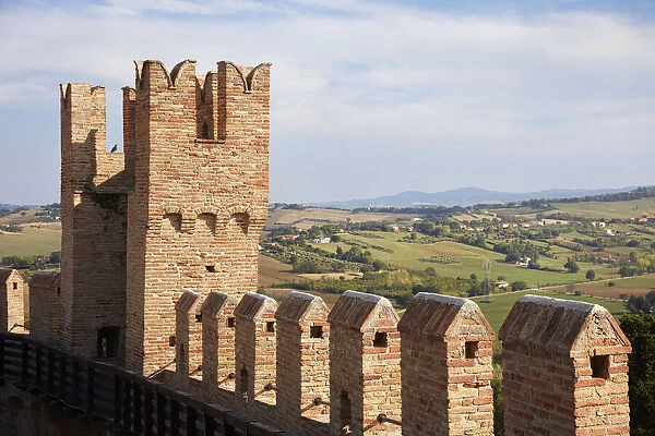 The walls of the medieval village of Gradara with the hills in the background