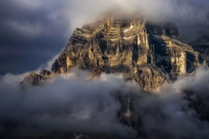 Framed Print : The walls of Mt. Pelmo in the Italian Dolomites hit by the golden light during a clearing storm in summer Framed Print : The walls of Mt. Pelmo in the Italian Dolomites hit by the golden light during a clearing storm in summer