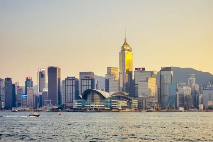 Framed Print : Wan Chai district and Hong Kong Convention and Exhibition Centre at sunset, Wan Chai