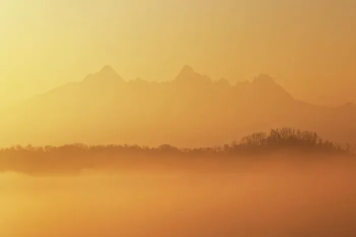 Framed Print : the warm light envelope the Apuan Alps during a winter sunrise, Tuscany, Italy Framed Print : the warm light envelope the Apuan Alps during a winter sunrise, Tuscany, Italy