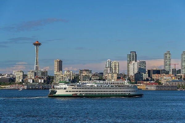 Washington State Ferry with downtown skyline and Space Needle behind, Seattle, Washington, USA