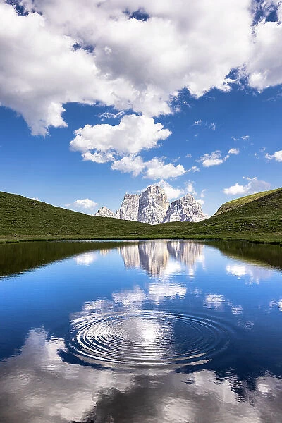 Water circles at Lago delle Baste with Monte Pelmo in the background. Altipiano of Mondeval, Giau pass, Cadore, Belluno province, Veneto, Italy
