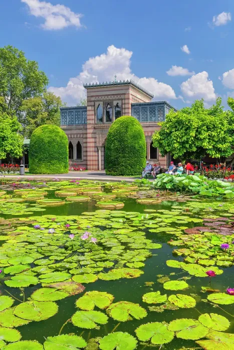 Framed Print : Water Lily pond with Moorish Manqueting Hall, zoological and botanical gardens, Wilhelma, Stuttgart, Baden-Wurttemberg; Germany Framed Print : Water Lily pond with Moorish Manqueting Hall, zoological and botanical gardens, Wilhelma, Stuttgart, Baden-Wurttemberg; Germany