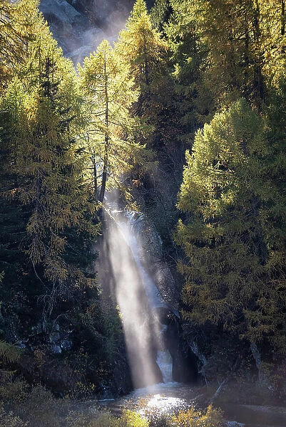 Waterfall in autumn season, Graubunden Canton, Switzerland