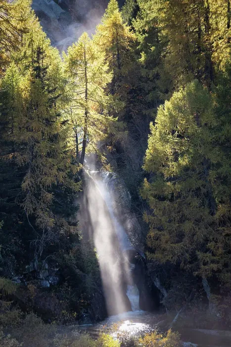 Framed Print : Waterfall in autumn season, Graubunden Canton, Switzerland