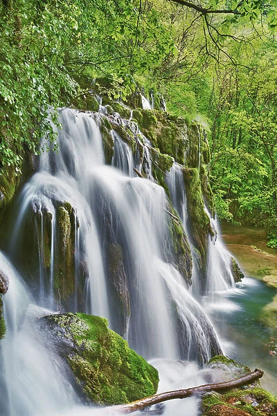 Waterfall Cascade des Tufs in beech forest - France, Bourgogne-Franche-Comte, Jura