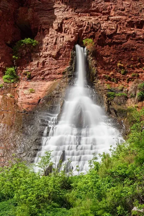 Framed Print : A waterfall pouring out of sandstone walls near the Colorado River, Grand Canyon National Park, Arizona, USA