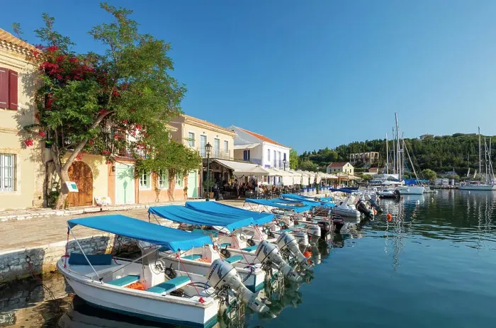 Framed Print : Waterfront cafes at Fiskardo Harbour, Kefalonia, Ionian Islands, Greece