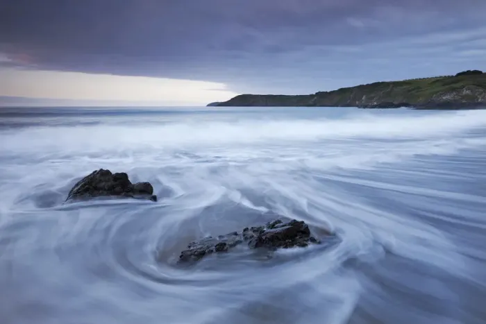 Framed Print : Waves rush onto the beach at Kennack Sands, Lizard Peninsula, Cornwall, England. Spring Framed Print : Waves rush onto the beach at Kennack Sands, Lizard Peninsula, Cornwall, England. Spring