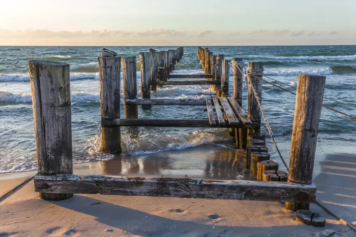 Framed Print : Weathered wooden jetty on the beach in Zingst, Mecklenburg-Western Pomerania Framed Print : Weathered wooden jetty on the beach in Zingst, Mecklenburg-Western Pomerania