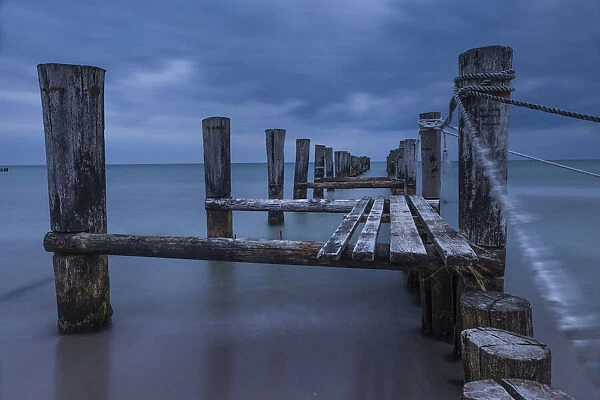 Weathered wooden jetty on the beach in Zingst, Mecklenburg-Western Pomerania