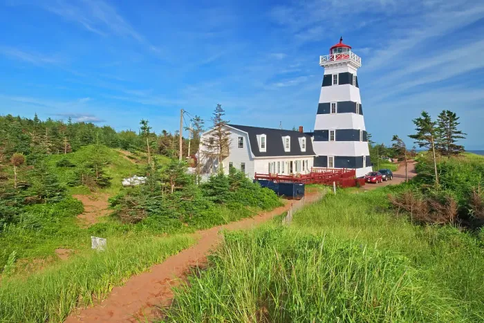 Framed Print : West Point Lighthouse and red sand West Point, Prince Edward Island, Canada Framed Print : West Point Lighthouse and red sand West Point, Prince Edward Island, Canada