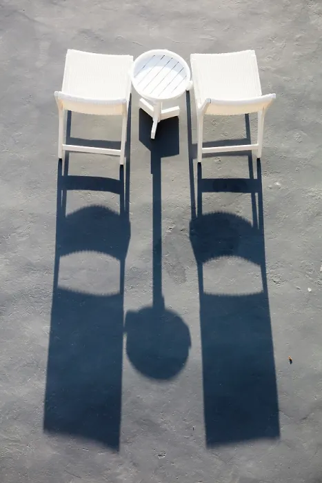 Framed Print : White chair and shadows, Imerovigli, Santorini, Cyclades Islands, Greece, Europe
