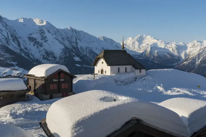 Framed Print : The white church of Bettmeralp in winter. Bettmeralep, Vallese, Switzerland, Europe