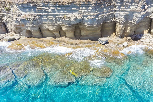 White limestone cliffs Pillar of Hercules washed by Caribbean Sea, aerial view by drone