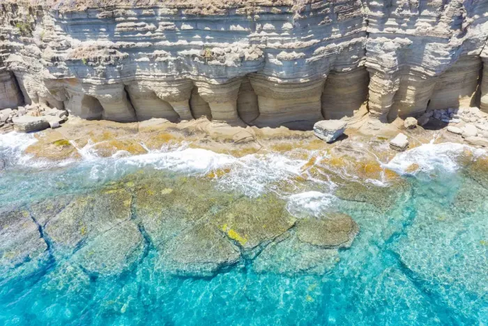 Framed Print : White limestone cliffs Pillar of Hercules washed by Caribbean Sea, aerial view by drone