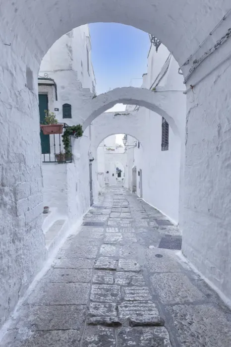 Framed Print : White narrow street of Polignano a Mare, Apulia, Italy Framed Print : White narrow street of Polignano a Mare, Apulia, Italy