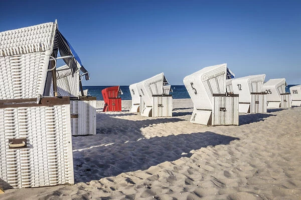 White and red beach chairs in Boltenhagen, Mecklenburg-Western Pomerania