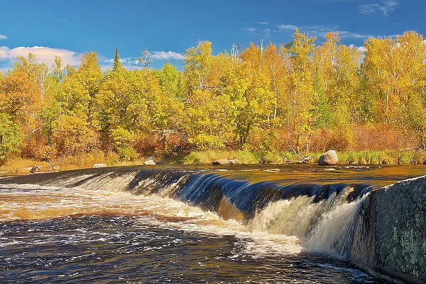 Whiteshell River flows into White Lake at Rainbow Falls in autumn Whiteshell Provincial Park Manitoba, Canada