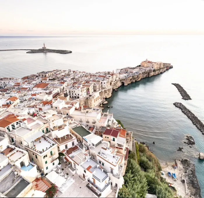 Framed Print : Whitewashed houses in the old town of Vieste at sunrise, aerial view, Foggia province Framed Print : Whitewashed houses in the old town of Vieste at sunrise, aerial view, Foggia province