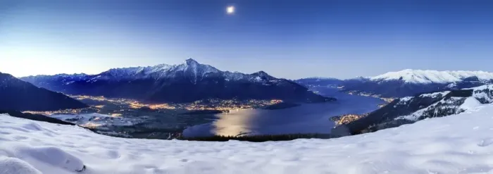 Framed Print : Wide angle shot of Alto Lario with Como lake and mount Legnone lighted by the moon in winter