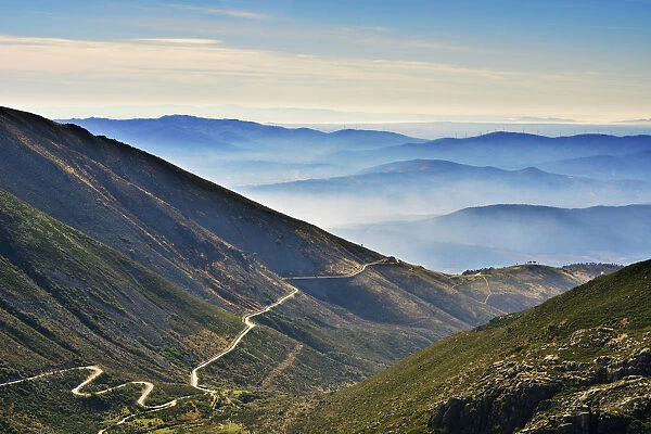 Winding road to the Acor mountain range. Serra da Estrela Nature Park, Portugal