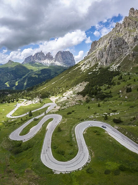 winding road of the Pordoi Pass during a summer day. Fassa Valley, Dolomiti, Canazei