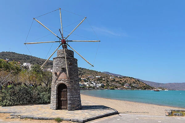 Windmill at the beach of Elounda, Mirabello Gulf, Lasithi, Crete, Greece