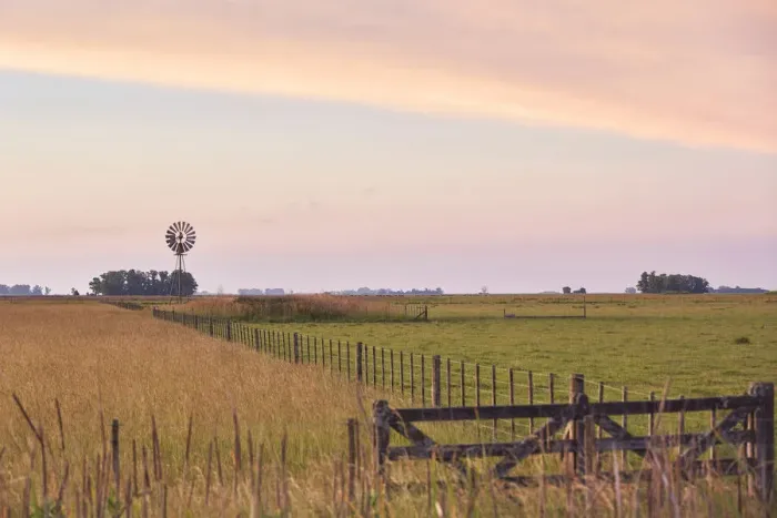 Framed Print : A windmill in a field of the Argentine pampas at twilight, Colman, Argentina Framed Print : A windmill in a field of the Argentine pampas at twilight, Colman, Argentina