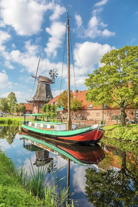 Framed Print : Windmill OstGrossefehn and peat ship on the Fehn Canal, Grossefehn, East Frisia, Lower Saxony, Germany Framed Print : Windmill OstGrossefehn and peat ship on the Fehn Canal, Grossefehn, East Frisia, Lower Saxony, Germany