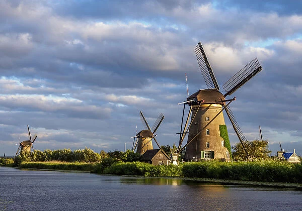 Windmills in Kinderdijk at sunset, UNESCO World Heritage Site, South Holland, The