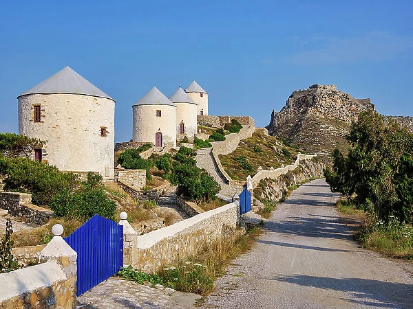 Windmills of Pandeli with Medieval Castle in the background, Leros Island, Dodecanese, Greece