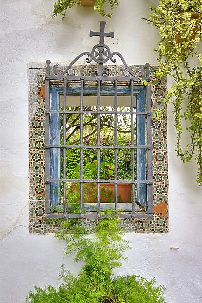 Window in the Patio de los Jardineros, Palacio de Viana, a 14th century palace. Cordoba, Andalucia, Spain