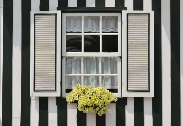 Framed Print : Window of a traditional striped painted house in the little seaside village of Costa Nova Framed Print : Window of a traditional striped painted house in the little seaside village of Costa Nova