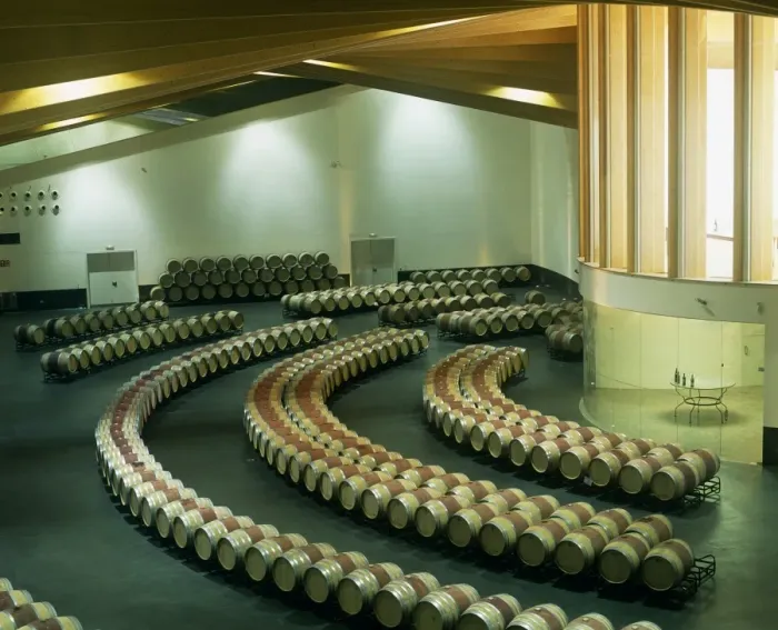 Framed Print : Wine barrels are laid out in artistic curves at Ysios winery Framed Print : Wine barrels are laid out in artistic curves at Ysios winery