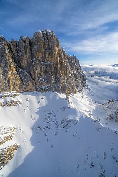 Winter aerial view of south face of Marmolada and Colle Ombretta, Dolomites