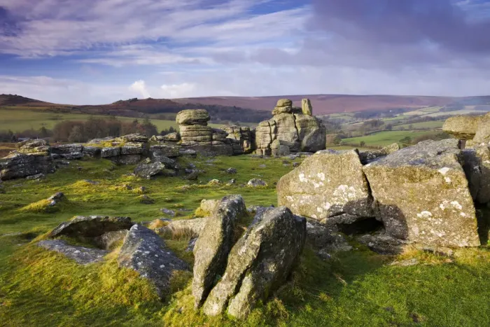 Framed Print : Winter morning sunshine glows on Hound Tor, Dartmoor National Park, Devon, England Framed Print : Winter morning sunshine glows on Hound Tor, Dartmoor National Park, Devon, England