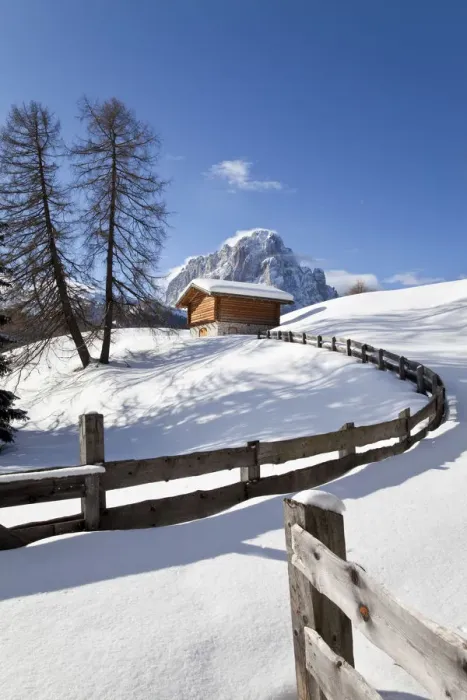 Framed Print : Winter snow covered mountain hut in front of Sassolungo mountain (3181m), Val Gardena Framed Print : Winter snow covered mountain hut in front of Sassolungo mountain (3181m), Val Gardena