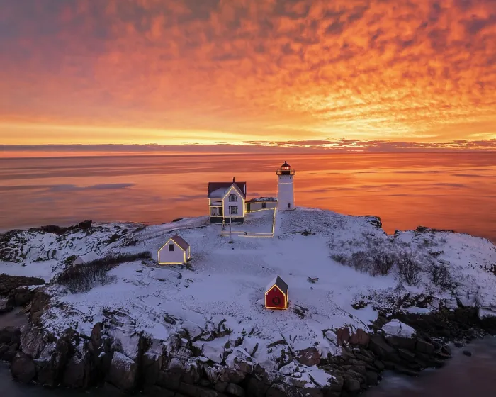 Framed Print : Winter sunrise with holiday lights at Nubble Lighthouse, York, Maine, USA Framed Print : Winter sunrise with holiday lights at Nubble Lighthouse, York, Maine, USA