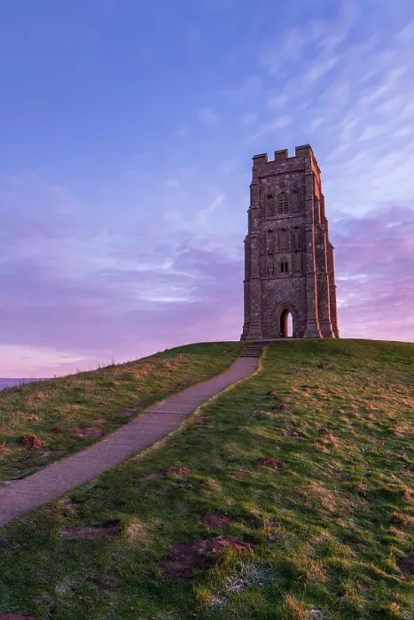 Framed Print : Winter sunrise at St Michael's Tower on Glastonbury Tor, Somerset, England. Winter (December) 2019