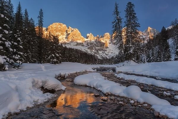 Winter sunset over the St Martins blades, Dolomites, Italy