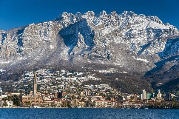 Winter view of city of Lecco with Mount Resegone in the background, Lake Como, Lombardy